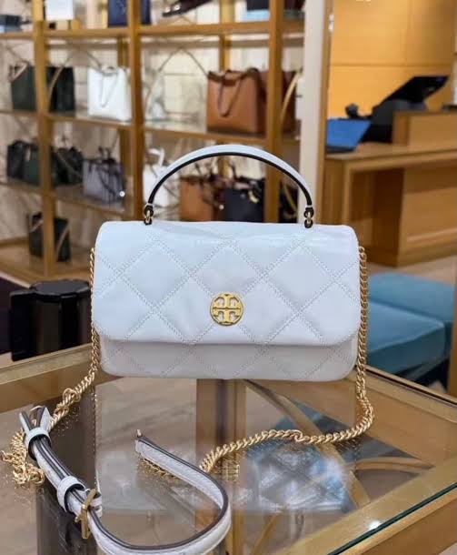 Tory Burch Willa Mini Top Handle Bag in a quilted, glossy patent leather