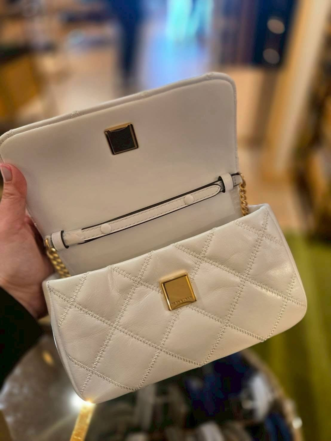 Tory Burch Willa Mini Top Handle Bag in a quilted, glossy patent leather